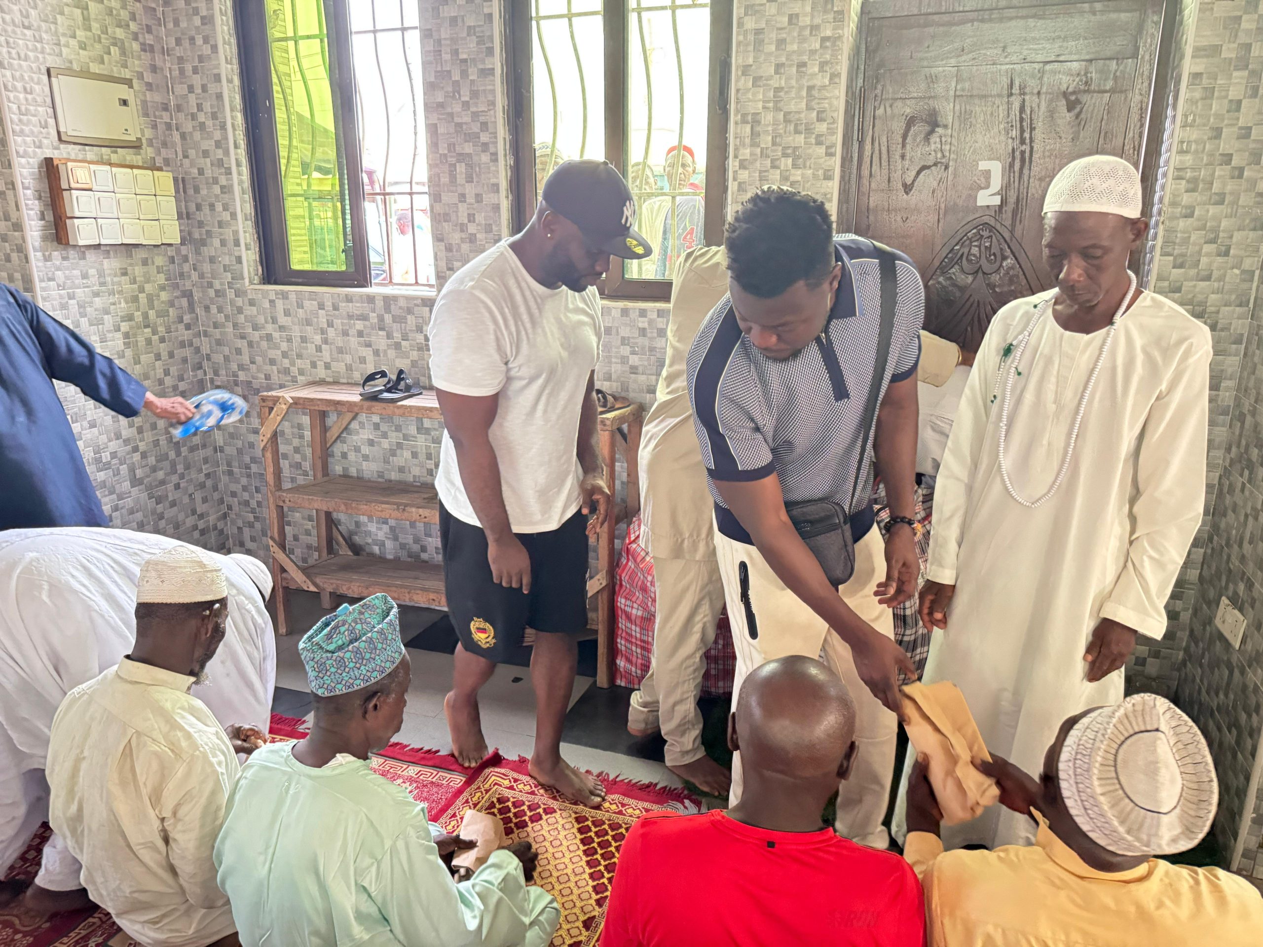 US-based Ghanaian donates food to vulnerable groups in Nima, East Legon